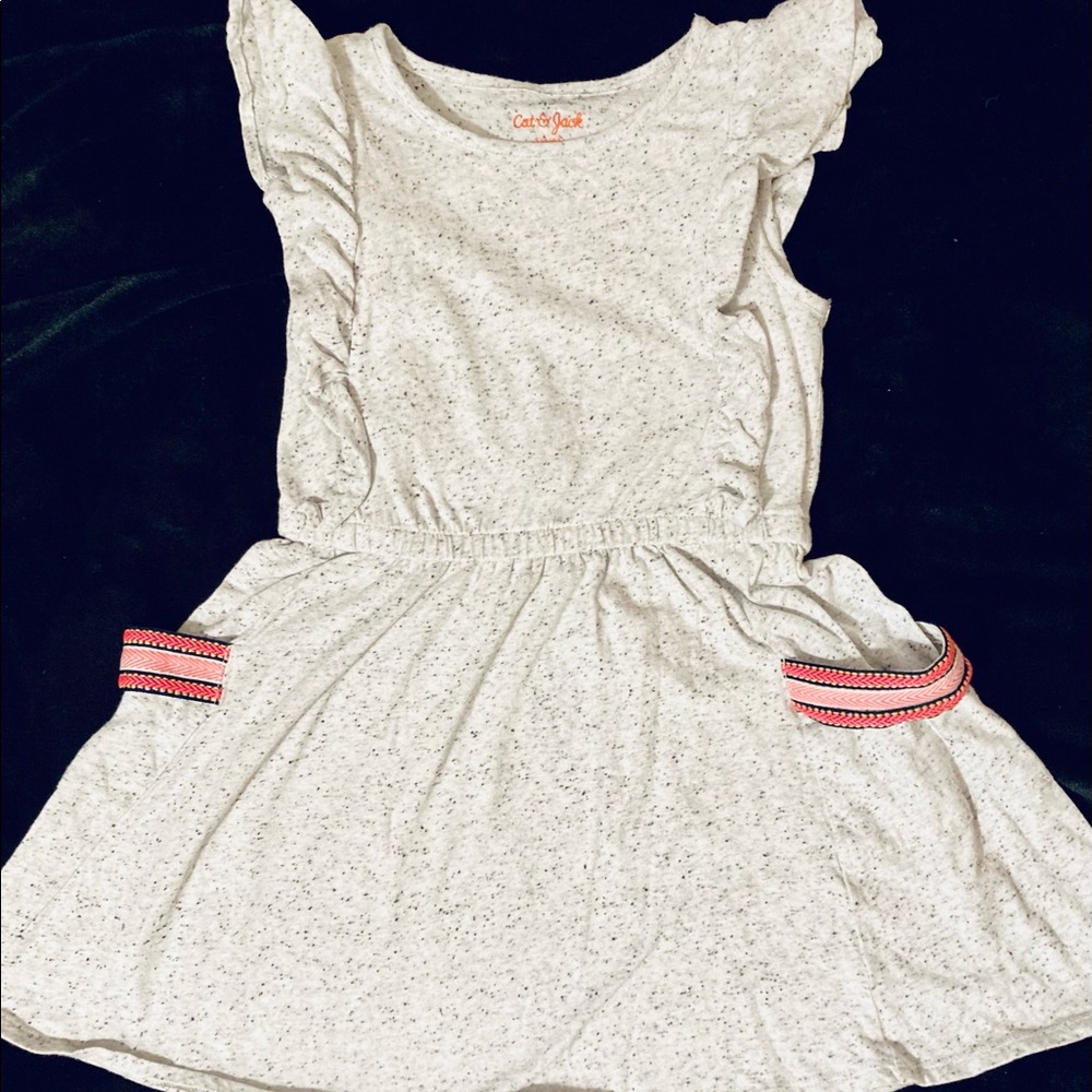 Speckled grey dress with little pockets in the front